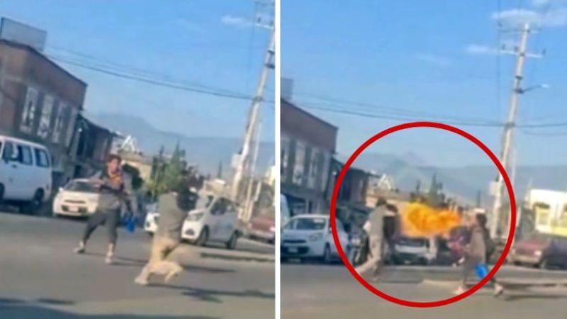 Captaron una pelea épica entre un "tragafuegos" y un "limpia vidrios" (Video)