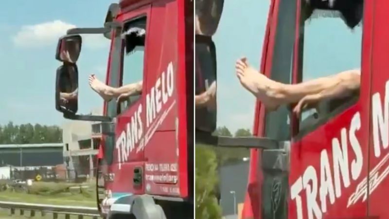 Camionero manejando con una mano y un pie afuera de la ventanilla (Video)